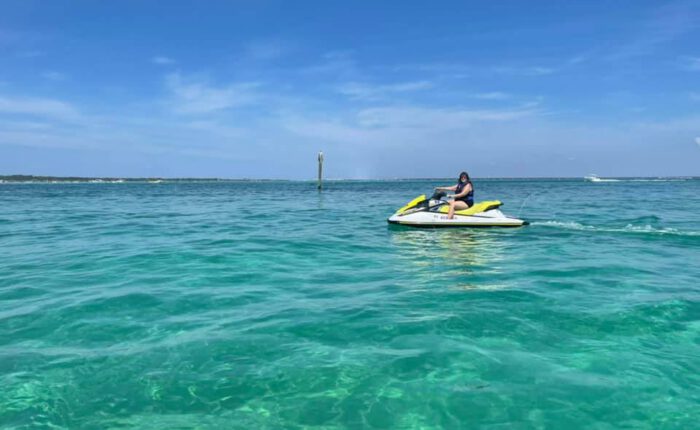 A person on a jetski in the sea